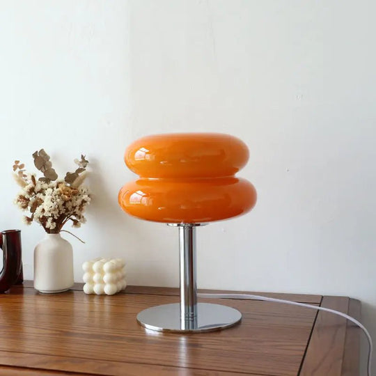 Moderne bedlampen in macaron-stijl, kleurrijke en speelse verlichting voor een levendig interieur.