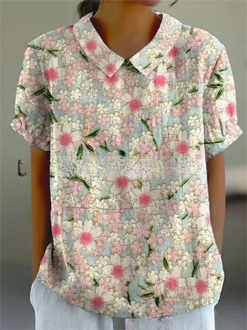 Mila Bloemen Shirt, met een vrolijk bloemenmotief voor de perfecte zomerse look.