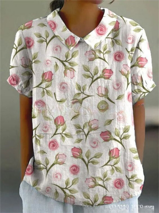 Mila Bloemen Shirt, met een vrolijk bloemenpatroon voor een zomerse sfeer.