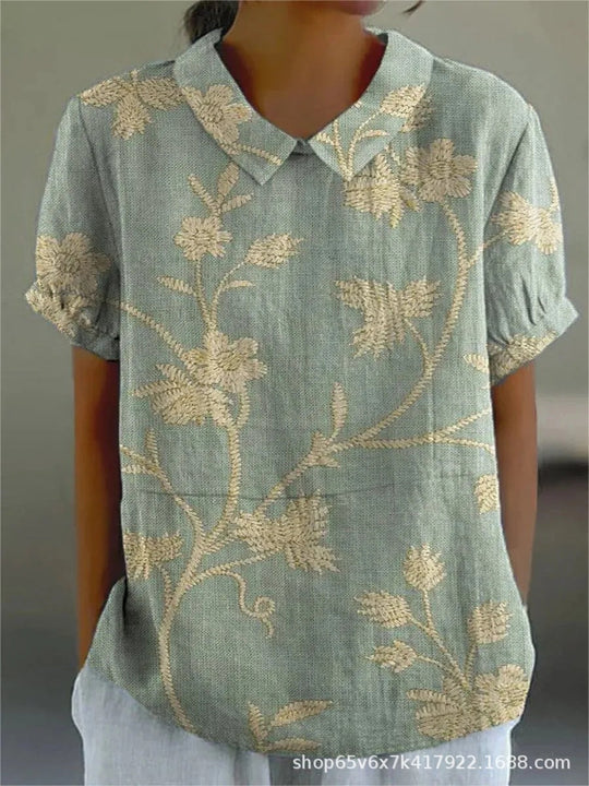 Mila Bloemen Shirt, met een kleurrijk bloemenpatroon voor een zomerse flair.