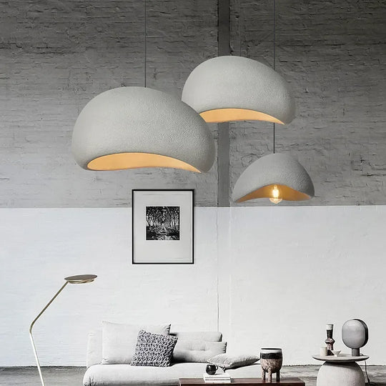 Minimalistische hanglampen met een sculpturale uitstraling, perfect voor stijlvolle en sfeervolle verlichting.