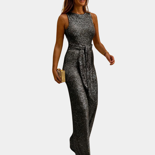 Elise Vrouwelijke elegante jumpsuit met een mouwloos ontwerp en een getailleerde pasvorm. Deze overall is perfect voor een chique en modieuze uitstraling, ideaal voor zowel casual als formele gelegenheden.