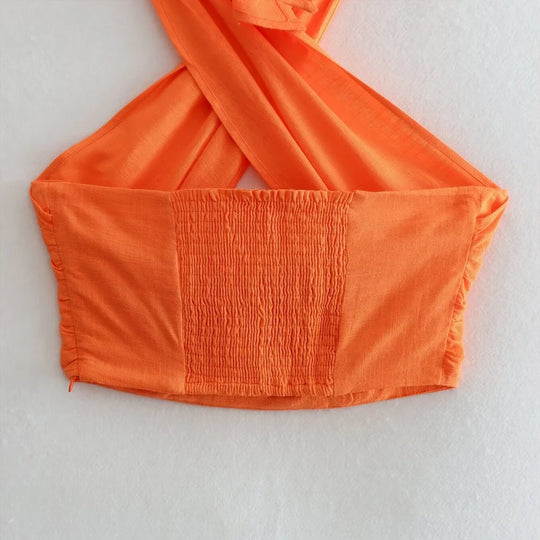 Mira | Korte haltertop met gekruist design voor dames | Oranje