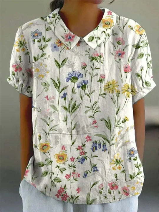 Mila Bloemen Shirt met bloemenpatroon, een must-have voor de zomer garderobe.