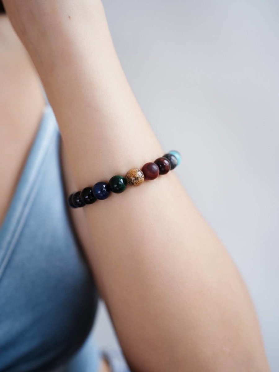 Isla moderne astronomische armband met planeten en unieke details, perfect voor liefhebbers van het universum.